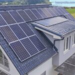 Housing solar system generating renewable energy for a modern family home.
