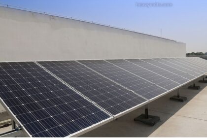 Solar panelled home with rooftop solar panels generating clean renewable energy from sunlight.