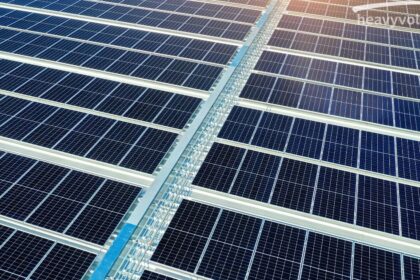Solar cells installed on a house roof capturing sunlight to generate electricity