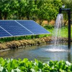 Solar water fountain powered by solar panels in a lush green garden, providing eco-friendly water circulation for sustainable outdoor landscaping.