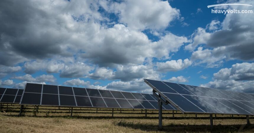 Solar panels on a house roof generating electricity in winter