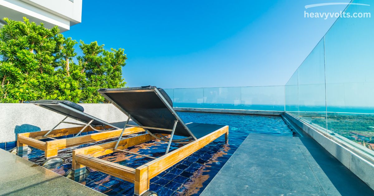 Solar panels installed on a rooftop powering a residential pool heating with solar.