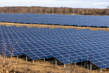 Large solar farm with rows of solar panels showing solar technology advantages for clean energy generation