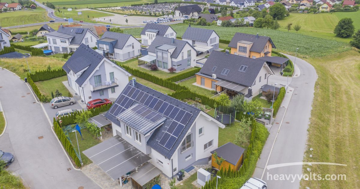Solar panels installed on a home roof for clean household energy.