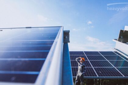Solar thermal panels installed on a home roof for heating water and providing renewable solar energy.